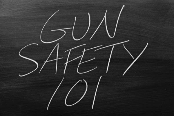 Chalkboard Writing Gun Safety 101 on a Chalkboard