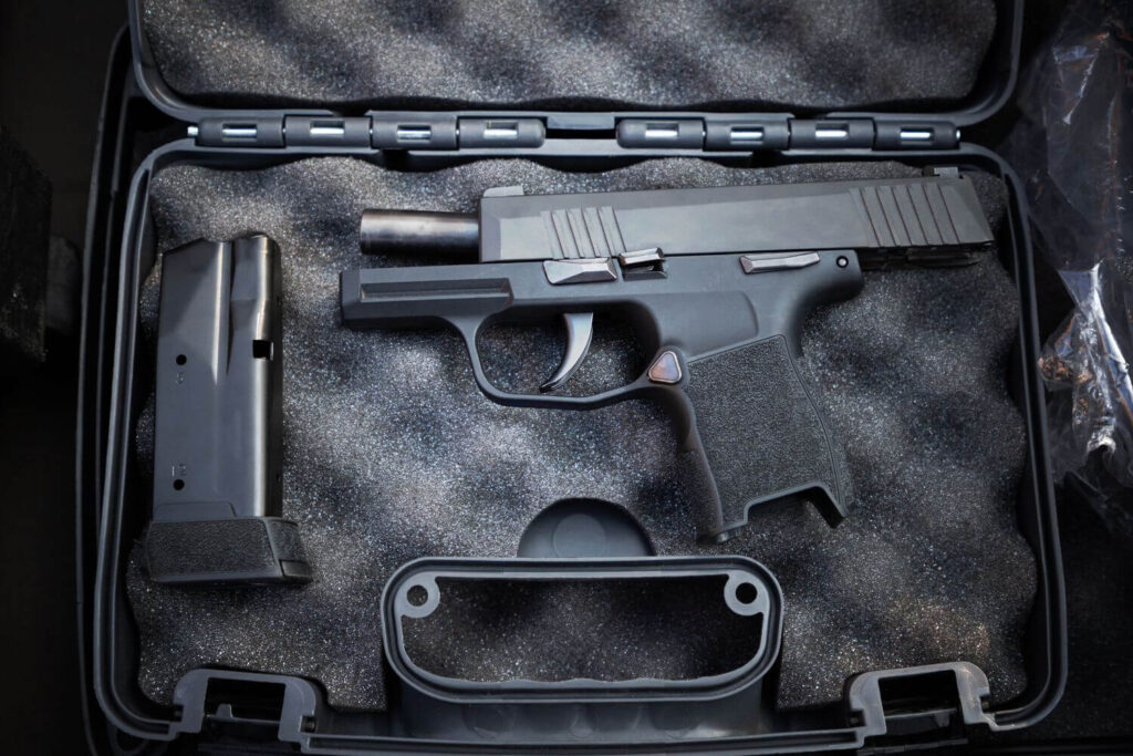 Gun and Magazine in a Black Box
