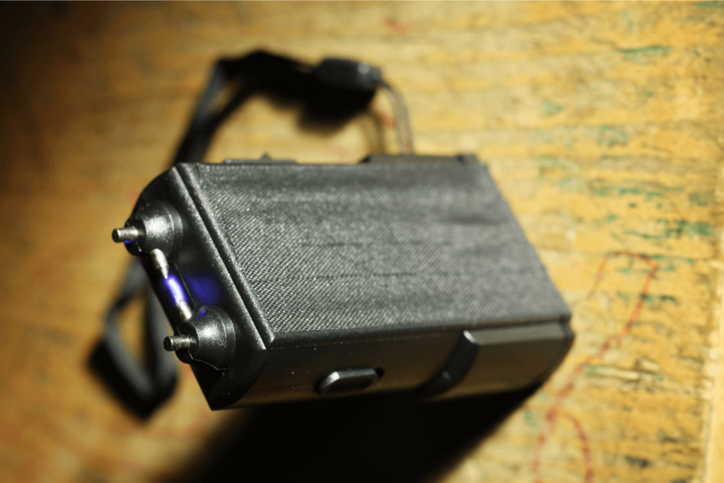 Black taser placed on a table