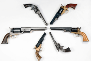 Six Antique Firearms Placed in the Shape of a Circle