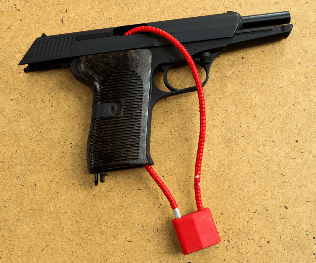 Firearm Locked with a Red Strap