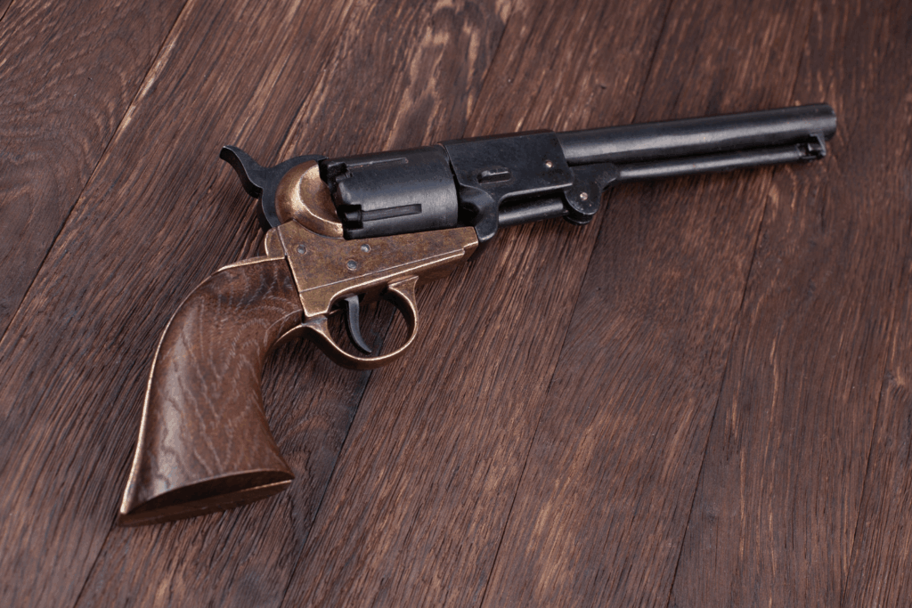 Antique firearm sitting on a wooden table