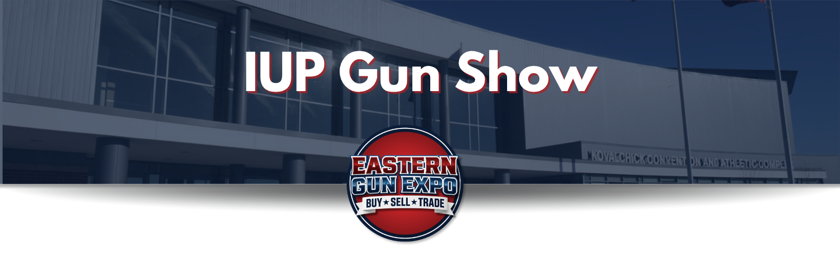 Banner announcing IUP Gun Show with the Eastern Gun Expo logo centered, set against a darkened building facade.